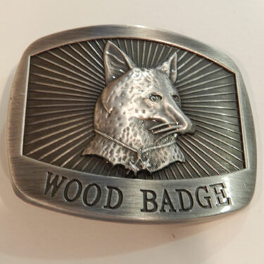 D. WOOD BADGE BELT BUCKLE - FOX